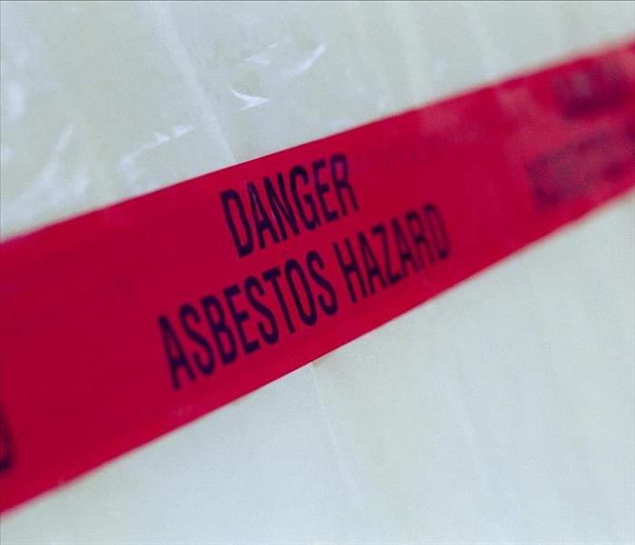 Red asbestos hazard warning tape