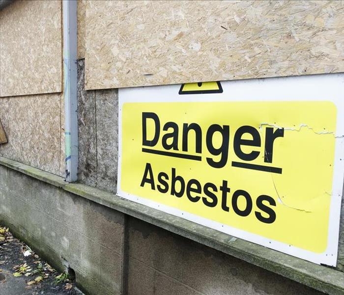 Asbestos Danger Warning Sign at House Site